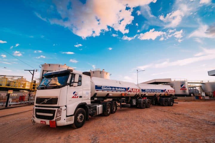 A white trailer truck on a factory